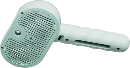 PetShiply Steam Grooming Brush in use